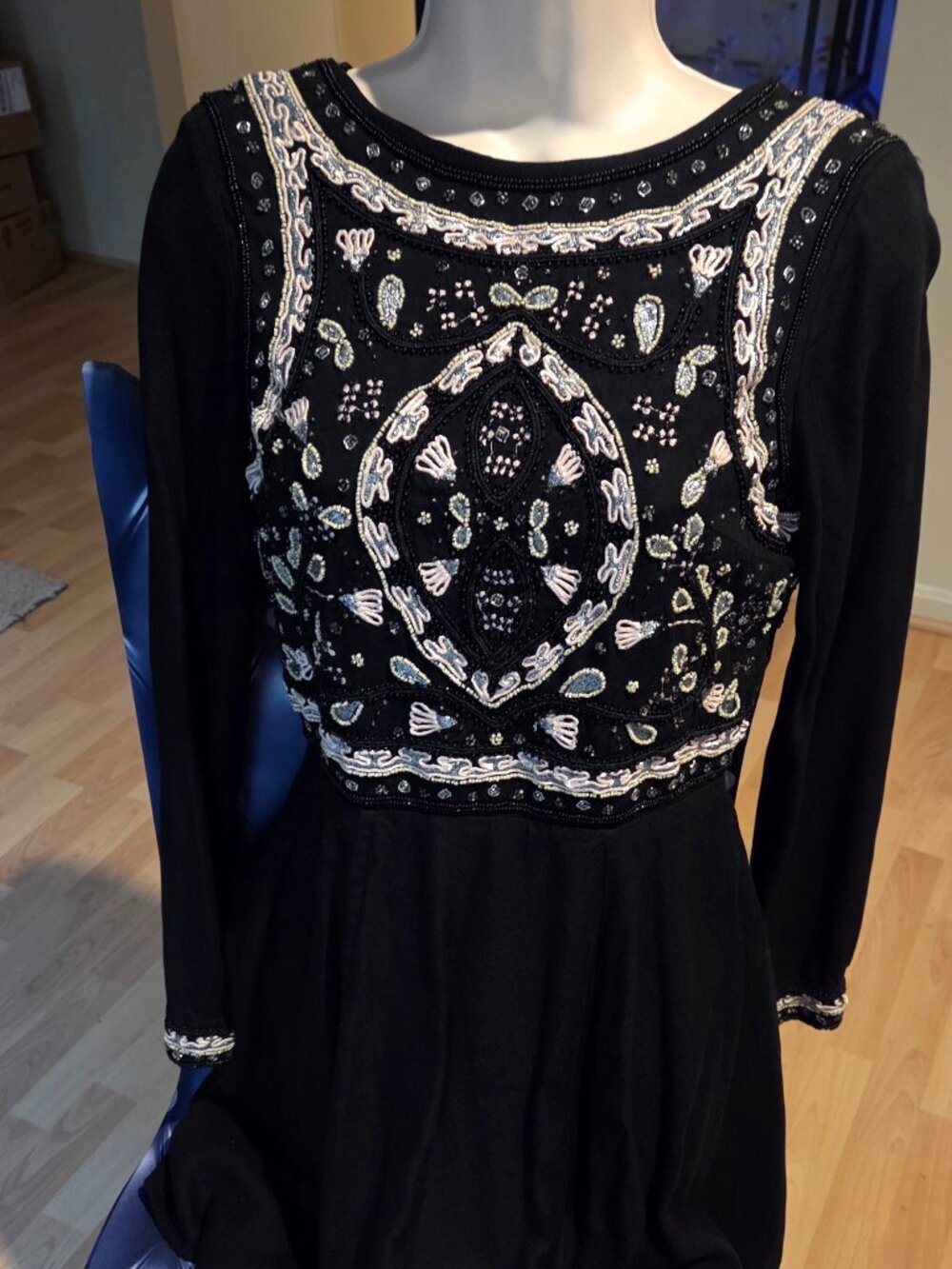 H&M embellished black mini dress long sleeves, open back size 6. Zipper in back